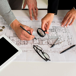architects-analysing-plan-with-magnifier_23-2148252113