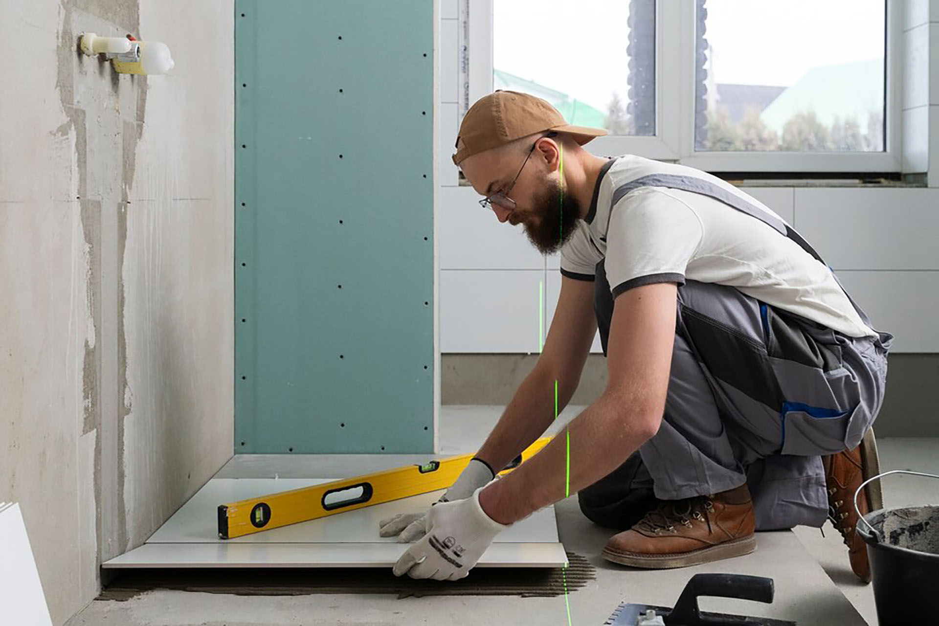 tiler-working-renovation-apartment_23-2149278633